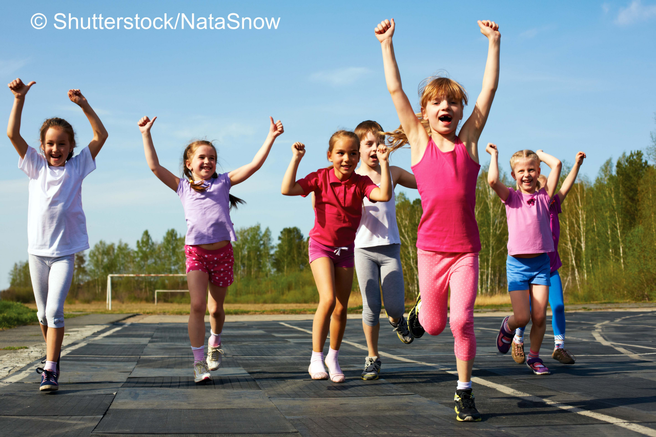 group of children running on the treadmill at the stadium