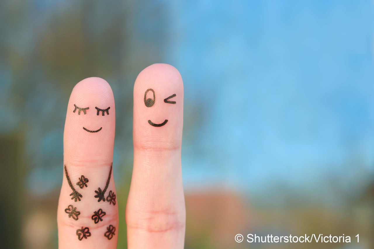 Fingers art of happy couple. Concept of butterfly in stomach.