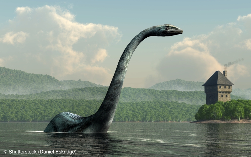 Nessie, the famed lake monster of Loch Ness in Scotland, rears out of the waters of the lake. A castle sits on the shores behind it. 3D Rendering
